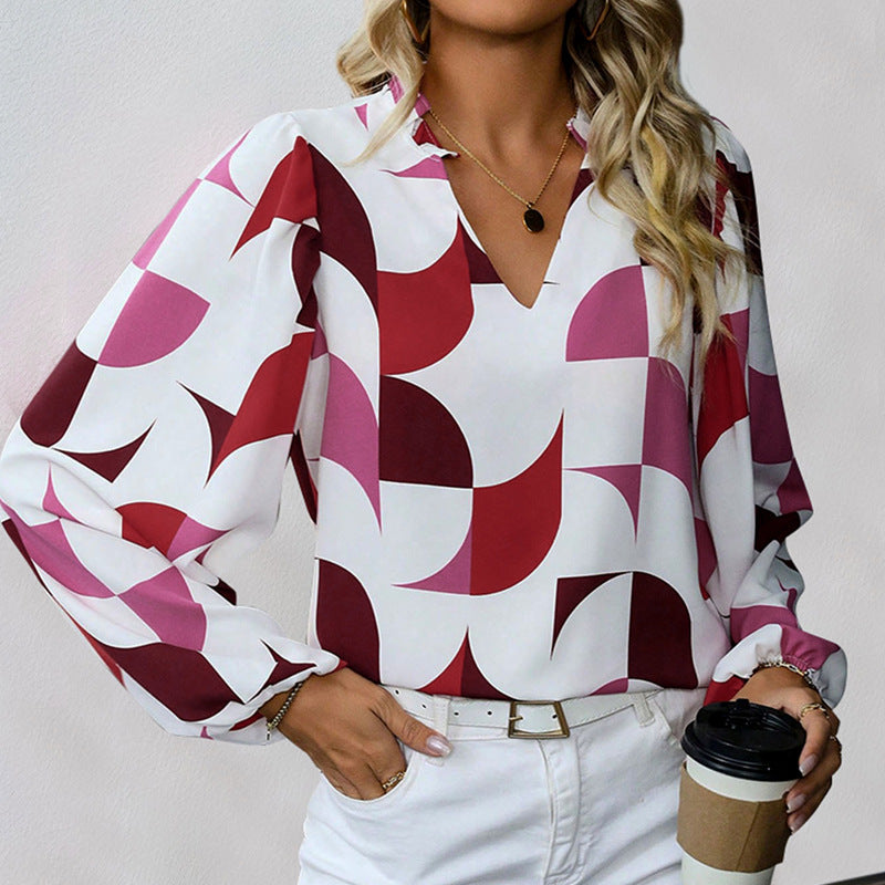Ava | Elegant Hösttröja med Puffärmar och Geometriskt Mönster 2