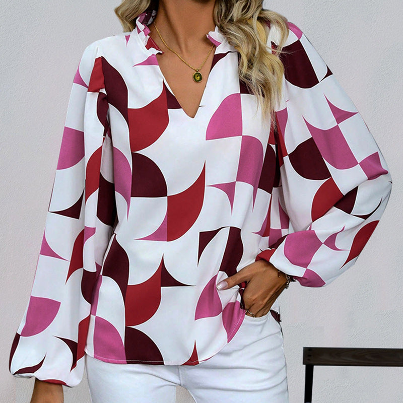 Ava | Elegant Hösttröja med Puffärmar och Geometriskt Mönster 3