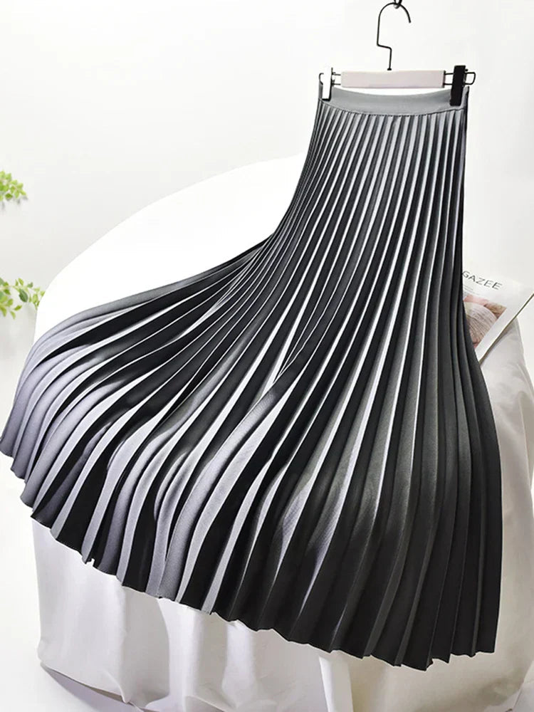 Elegant A-linje Midikjol med Plisserad Design och Elastisk Midja | Mångsidig Stil för Komfort och Klädval 4