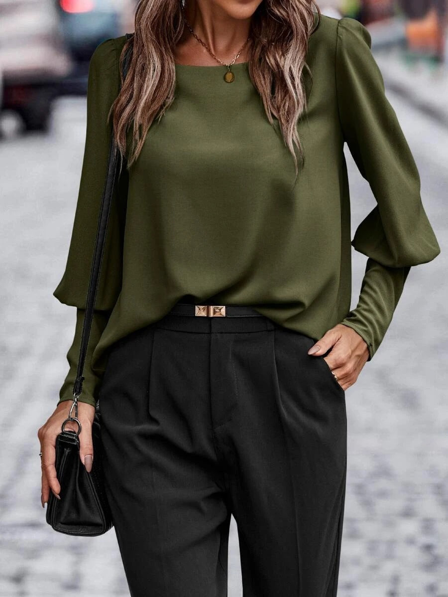 Elegant Blus Dam | Vit Blus med Puffärmar och Rund Halsringning | Tidlös Design för Vardag och Arbete 3