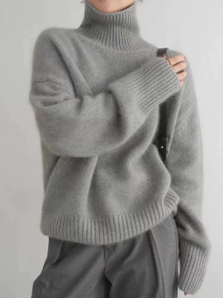 Elegant Oversized Stickad Dam Tröja med Rullhals och Ribbstickad Design för Bekväm Värme 1