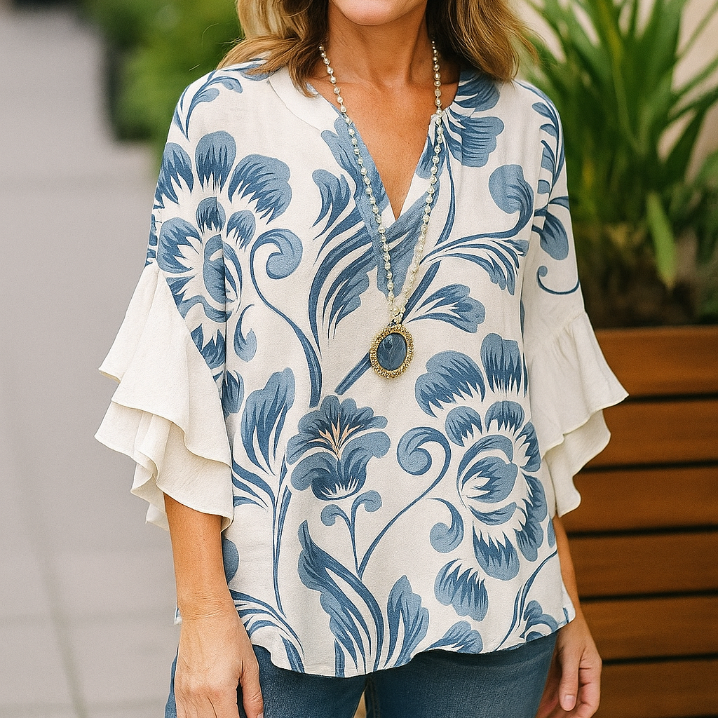 Emma | Avslappnad Blus med Fladdermusärmar och Blommigt Mönster 0