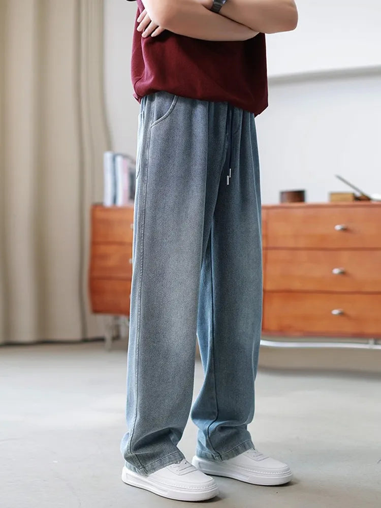 Ethan | Avslappnade Raka Jeans Herr med Medelhög Midja 1