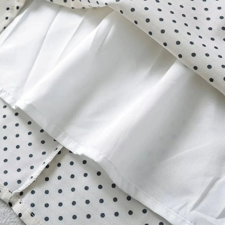 Prickig Mini Klänning med Puffärmar i Lätt Tyg | Tidlös Design för Eleganta Sommardagar 7