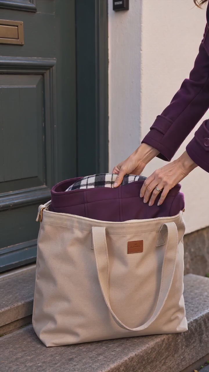 Kort film som visar modern design för värme och stil i rörelse — passform, material och detaljer.